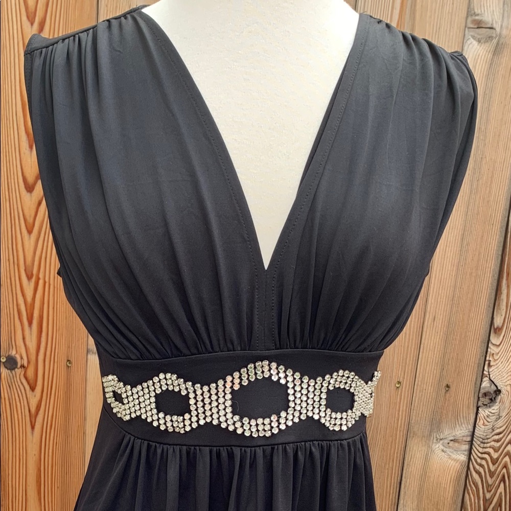 Sleeveless black dress with rhinestone underbust